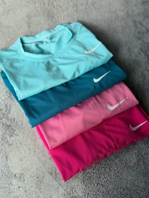 IMG-20251204-WA0121 Remera DRI-FIT Mujer