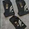 Short "AD" con detalle